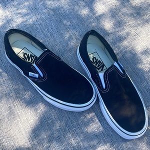 Black slip on vans. Womens size 5. Never worn